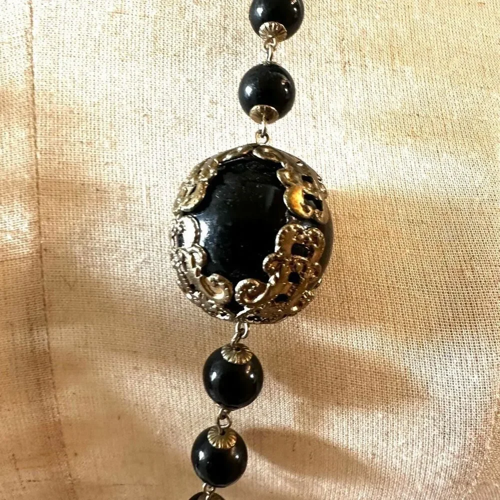 Vintage long black beaded necklace